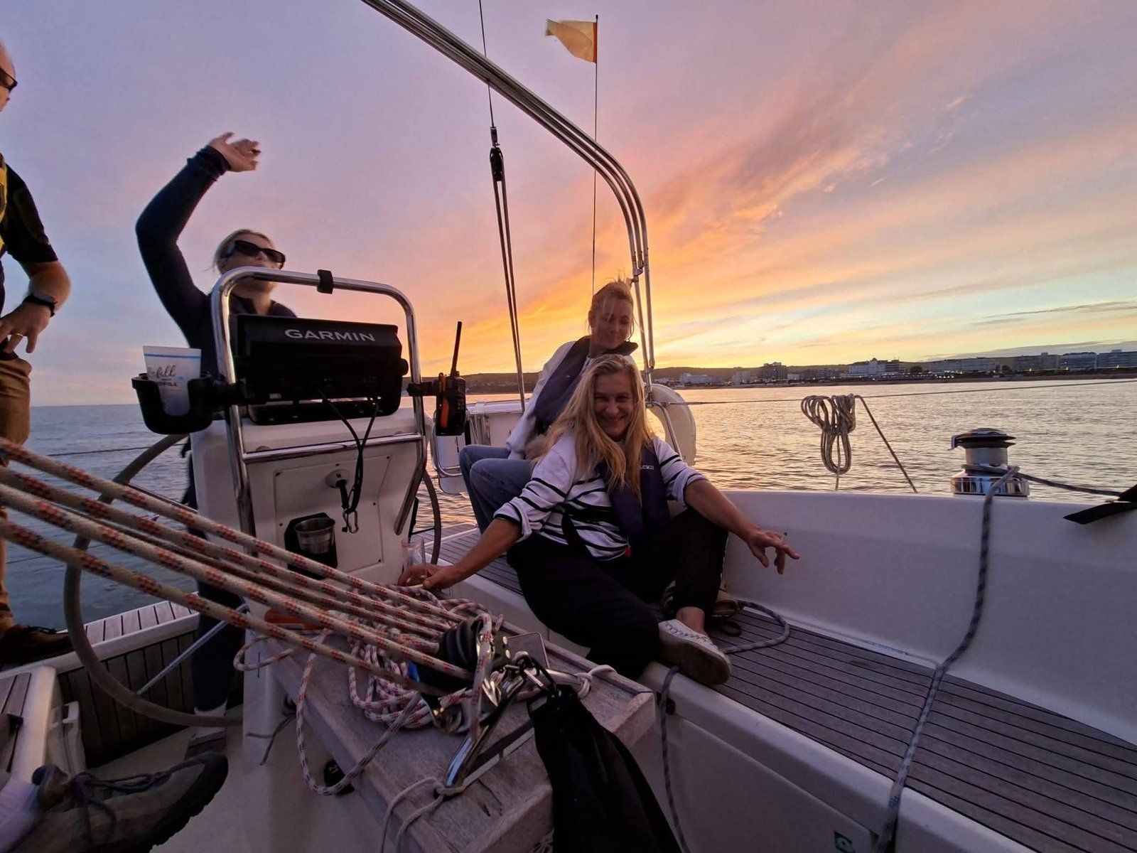 Private sunset yacht experience from Eastbourne, featuring relaxed deck seating and panoramic sea views